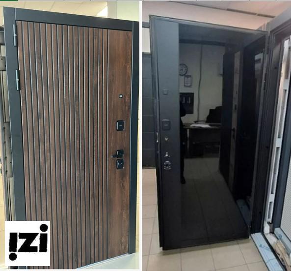 Входная дверь Дельта 12 ПВХ Орех грецкий + патина + наличники ПВХ черная шагрень